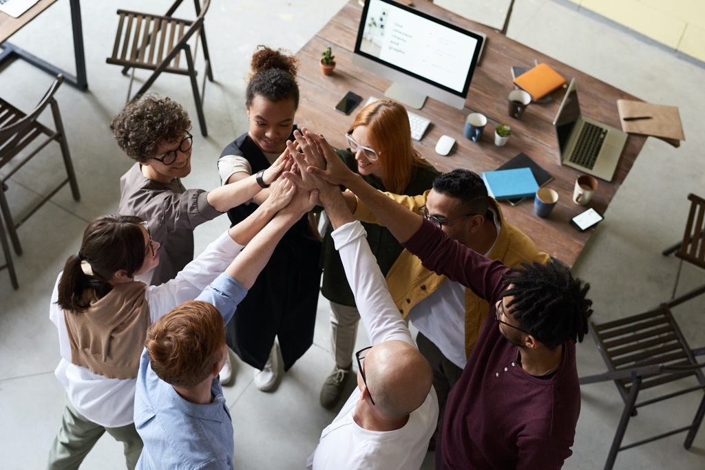 group of people hands on center